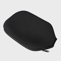 Black neoprene paddle cover photographed at an angle, showing the curved zippered edge.