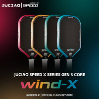 Four pickleball paddles in pink, orange, teal, and blue, angled side by side against a dark multicolor gradient background, showing the upper half of each paddle face and grip.