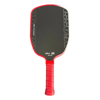 White background, close-up front view of a red and black paddle with a red perforated grip.