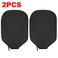 Two identical black neoprene paddle covers placed side by side.