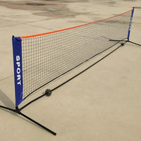 A single net set up on a concrete surface, showing the frame legs, orange top edge, and blue end panels at an angle.