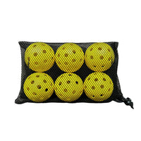 Six bright yellow perforated balls packed inside a black mesh drawstring bag.