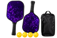 Two pickleball paddles printed with a purple constellation pattern, shown with four yellow balls and a black carry case with a clear front panel.